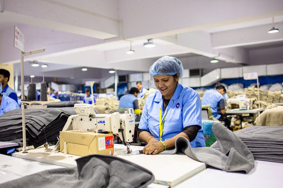 Garment worker sewing in a Bangladesh factory