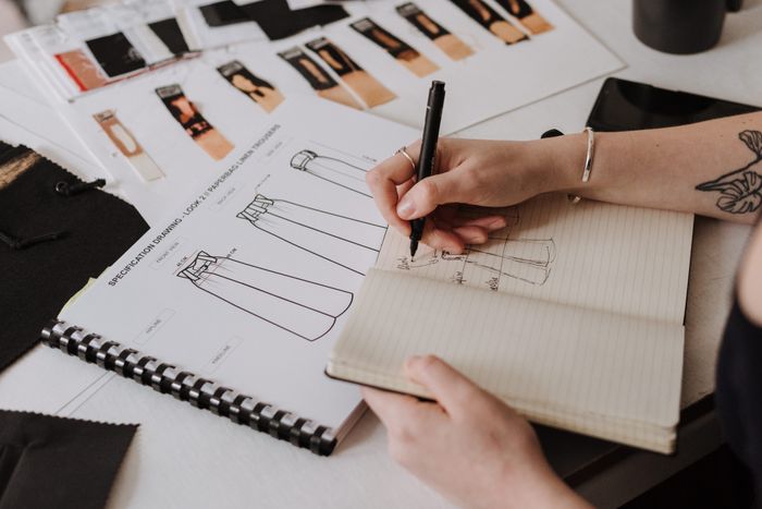 Designer sketching a new clothing collection